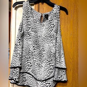 Gorgeous black and cream print sleeveless blouse
